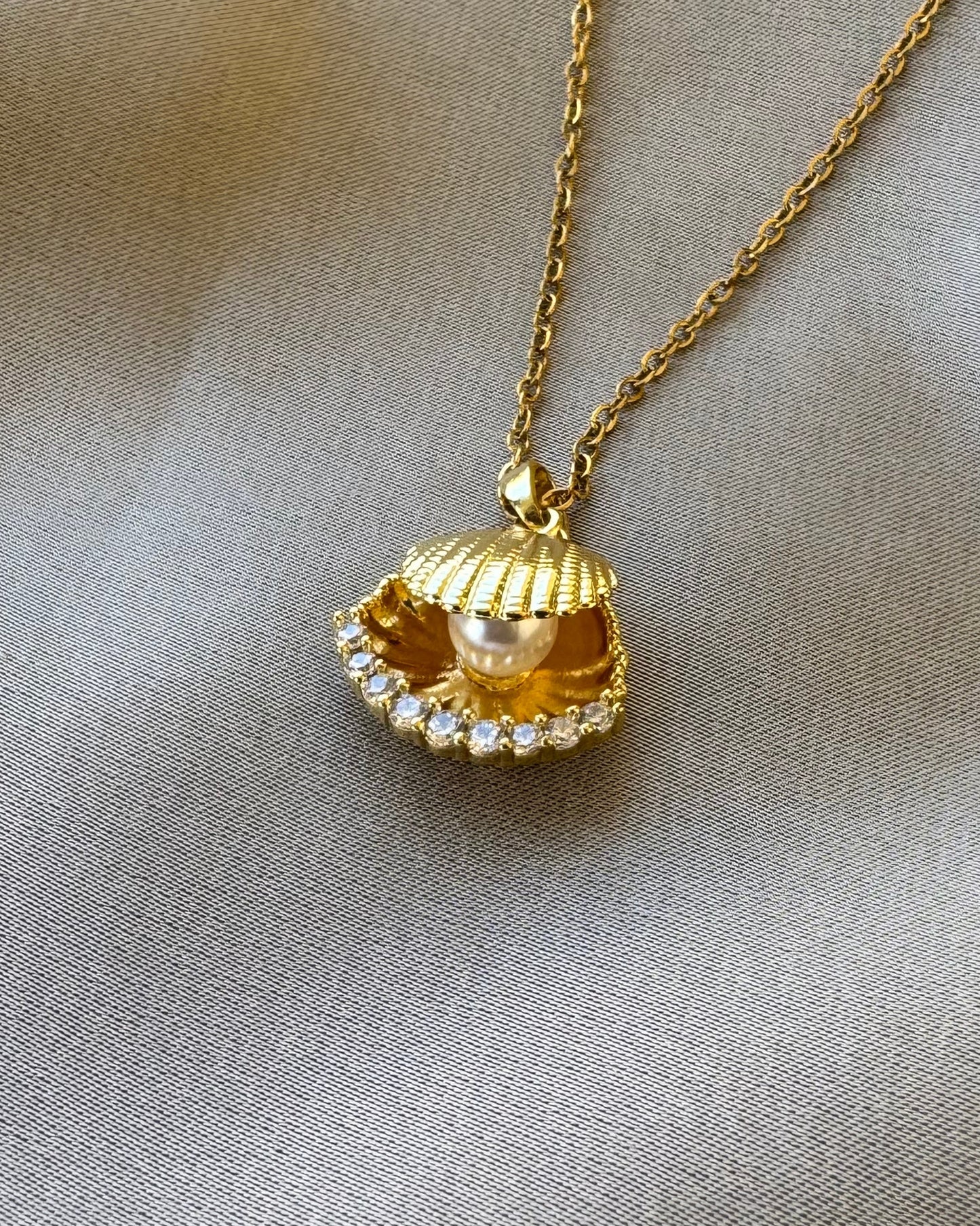Pearl in shell necklace